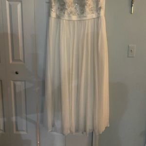 Off-white David’s bridal size 20w wedding dress.